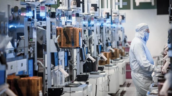 Semiconductor fab with stacks of wafers undergoing processing